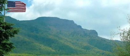Flag with mountain in background