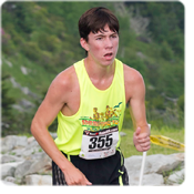 Matthew Cashin is the first to approach the finish line of the 2014 Critter Crawl. Photo by Skip Sickler.