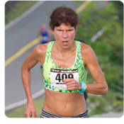 Annette Bednosky, the first woman to cross the finish line, did so in a new course record of 25:56. Photo by Skip Sickler.